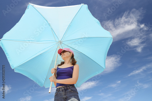 Young woman enjoying summer...