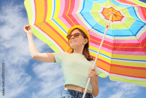 Young woman enjoying summer...