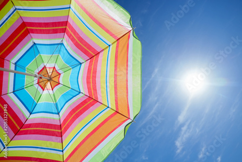 Colorful striped beach umbr...