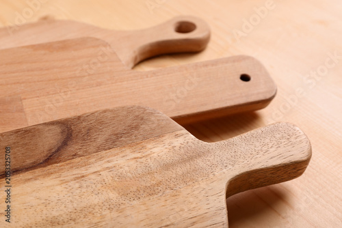 Three wooden cutting boards...