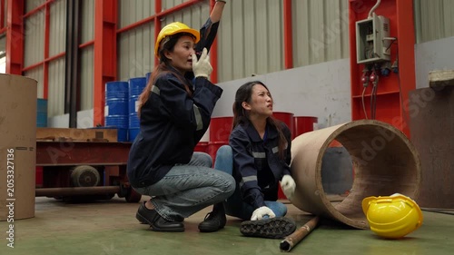 A female employee is helping her friend who was electrocuted in a metal cheese factory.(VDO 4K)