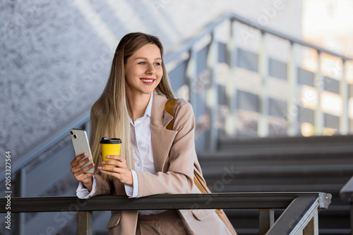 Smiling young businesswoman...