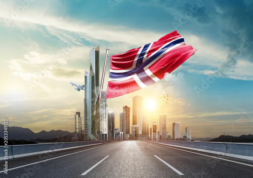 Fényképezés Norway flag waving with modern and developed landscape