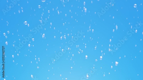 Abstract background of clear water bubbles and droplets floating in light blue liquid 3D rendering.