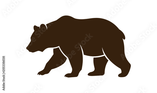 Silhouette of a Brown Bear Walking in Profile.