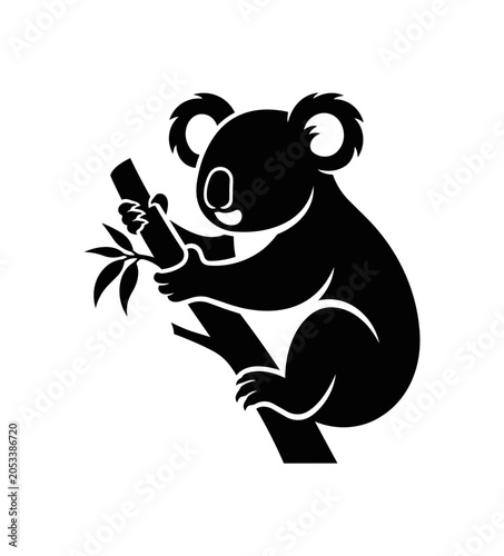 Silhouette of a Cute Koala Climbing a Tree Branch.