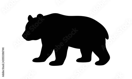 Silhouette of a Bear Walking Side View.