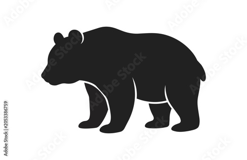 Silhouette of a walking bear in profile view.