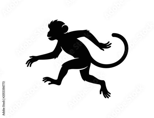 Silhouette of a playful monkey in motion.