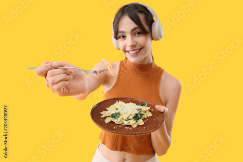 Smiling young woman with he...