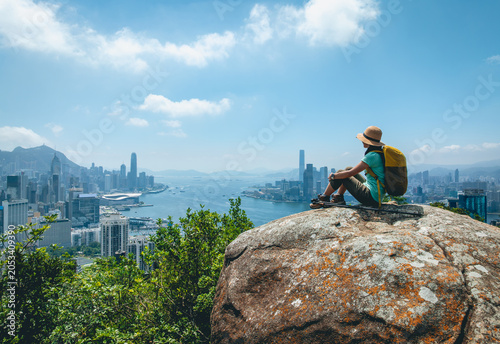 Canvas Print Woman hiking on mountain top in Hong Kong