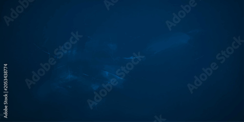 Fotografie Underwater abstract dark blue cloudy background.