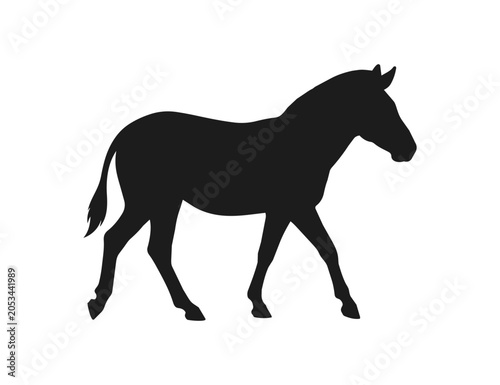 Silhouette of a walking zebra in profile view.