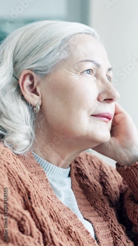 Senior, thinking and woman with memory in home for nostalgia, recall past and perspective. Retirement, elderly person and reminisce in apartment for sentimental reflection, contemplating and ponder