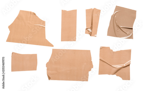 Brown adhesive tape pieces ...