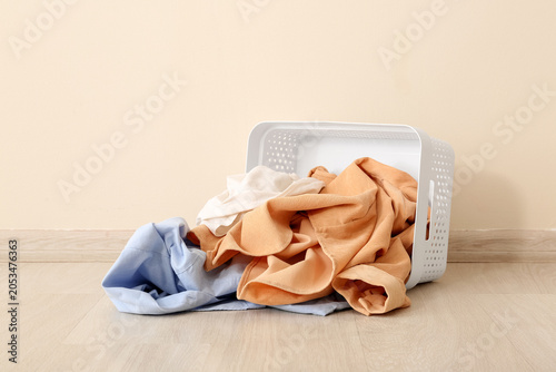 Laundry basket spilled with...