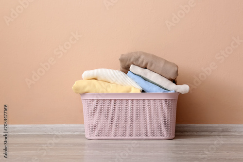 Clean folded laundry in pin...