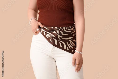 Fashionable woman in white ...