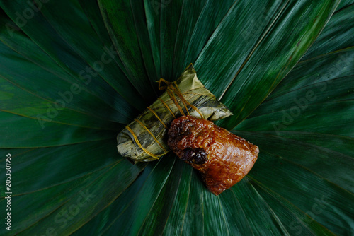 Green rice dumplings leaves with rice dumplings
