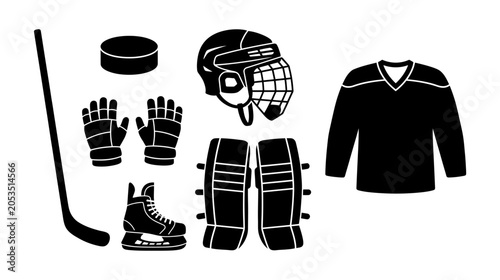 Photography Collection of hockey equipment including hockey stick, puck, helmet, gloves, ska