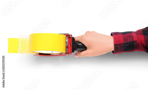 Hand holding yellow packing...
