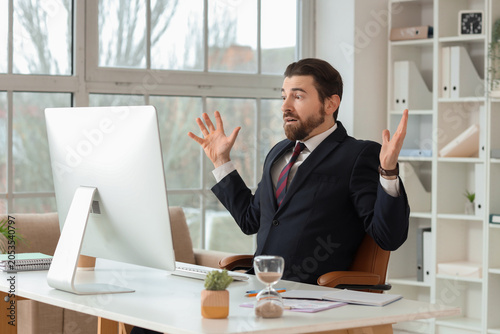 Frustrated businessman reac...