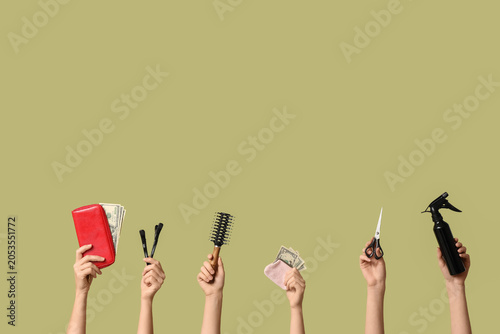 Hands holding hairdressing ...