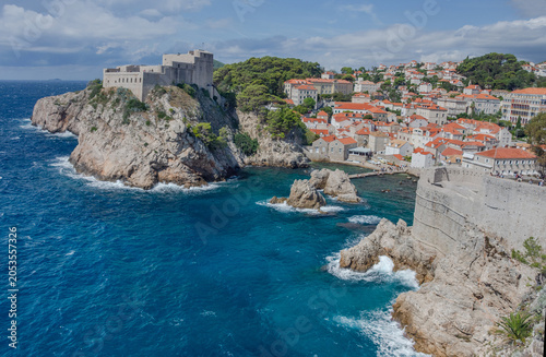 The historic Fort Lovrijenac on a rocky cliff and the blue Adriatic Sea in Dubrovnik, Croatia, on a sunny day