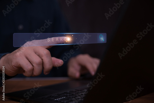 Data search technology search engine optimization person hands are using computer keyboard to searching for information using search console with