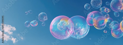 A vibrant composition showcasing numerous soap spheres in mid-air against a brilliant blue sky, some contain reflections and light refractions