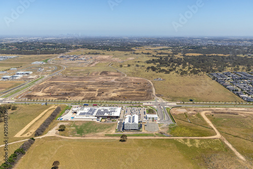 Mickleham Shopping Centre aerial view with Melbourne skyline in the distance