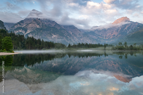 Εκτύπωση καμβά Picturesque Morning Fog at Almsee Lake with Forest and Mountain Alps in the back
