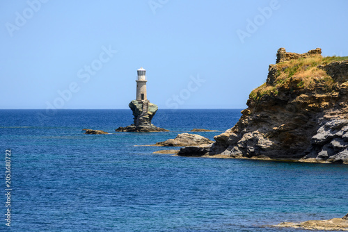 The Tourlitis Lighthouse in Andros Town stands on an islet. Andros island, Cyclades, Greece