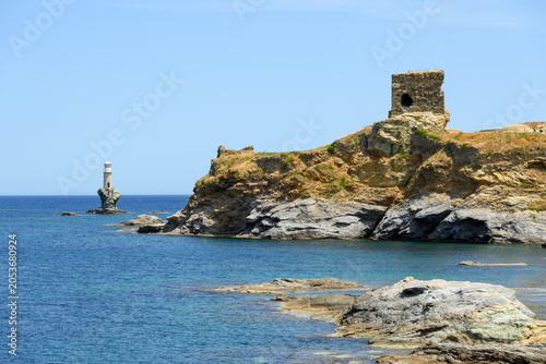 Andros Castle and Tourlitis Lighthouse of Chora. Andros island, Cyclades, Greece