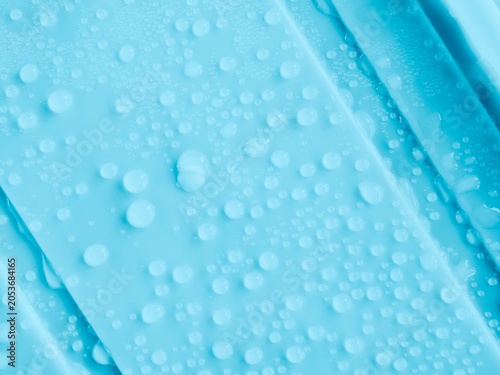Foto Water drop cold blue background pattern surface circle droples rain weather liquid backdrop, pur clean nature wet, platform aesthetic cosmetic presentation, buble droplets dew reflection spa