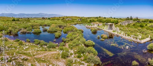 Panel kuchenny z motywem Miletus archaeological site, Faustina Baths ruins partially submerged in water, creating reflections in the historical landscape