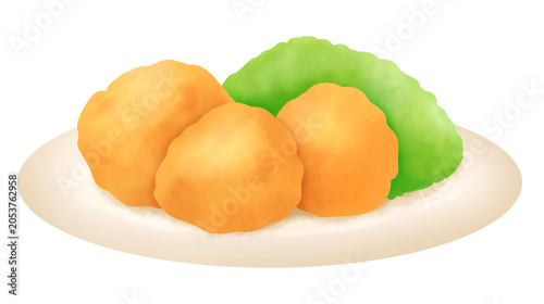 Foto お皿に盛られたから揚げと千切りキャベツ