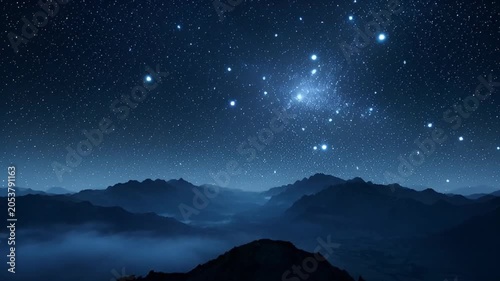 Night sky above mountain range illuminated by stars and celestial bodies