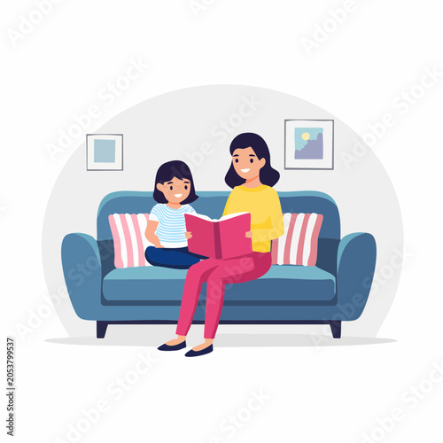 Mother and Daughter Reading a Book Together on the Couch