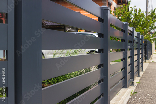 Modern fence with aluminum or metal shutter
