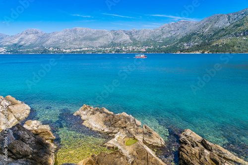 mountain lake and blue sky with clouds