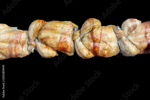 Grilled chicken rotisserie - an appetizing photo.