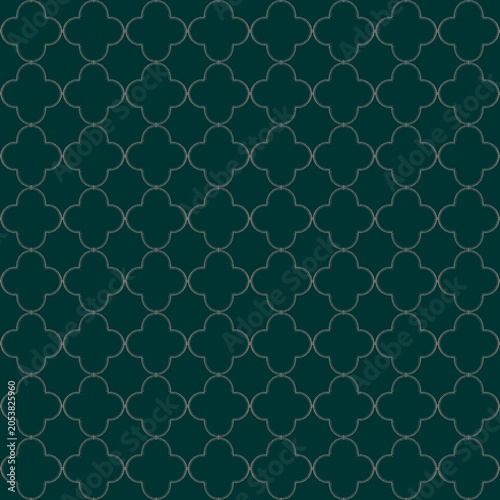 Decorative pattern in green color with repeating shapes and lines