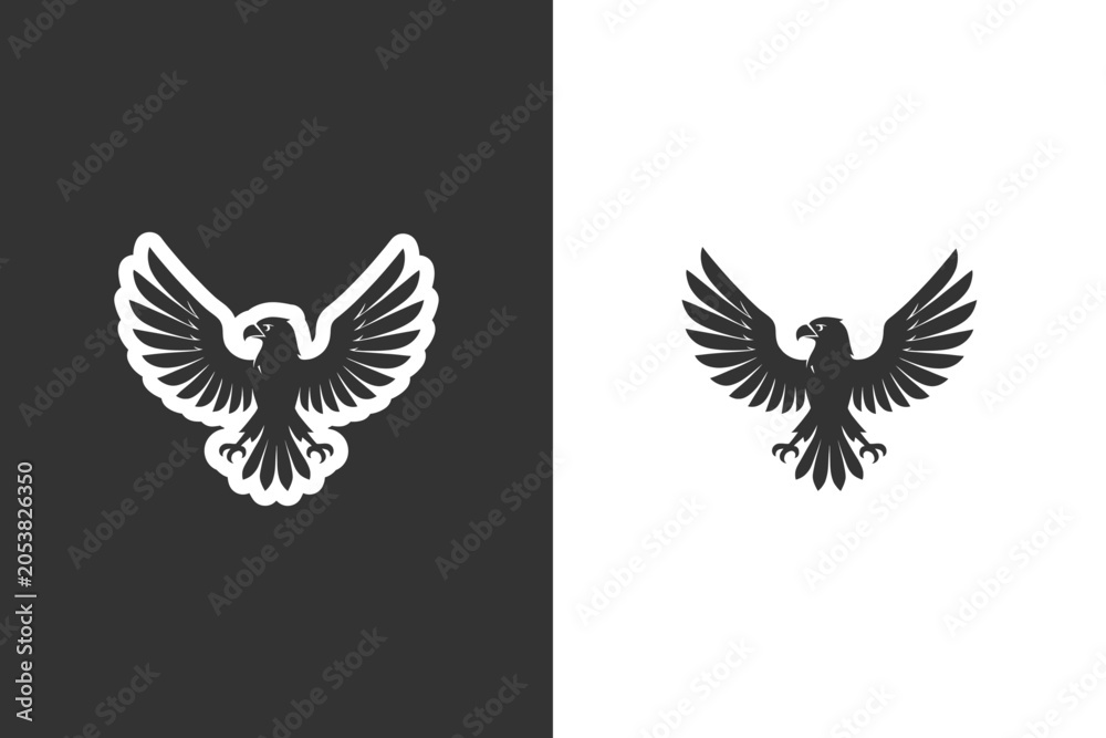 Fototapeta premium A stylized silhouette of an eagle with spread wings, presented on both black and white backgrounds