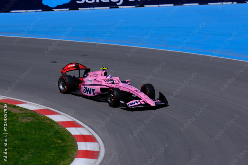 Obraz premium May 22, 2026, Montreal, Canada, F1 Academy car races through Circuit Gilles Villeneuve during Grand Prix weekend. g.