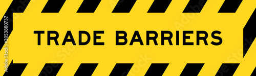 Quadro su tela Yellow and black color with line striped label banner with word trade barriers