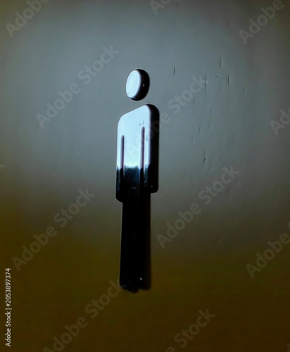 Restroom Male symbol illuminated by the sunlight