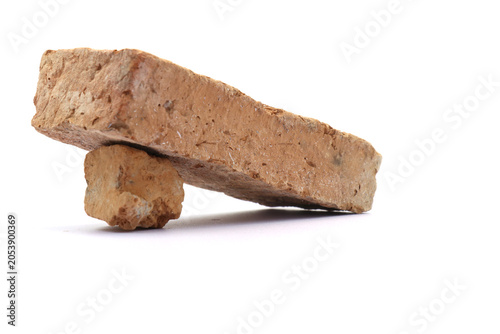 Foto Traditional bricks on a white background for wall construction.