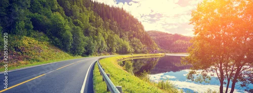 Panel kuchenny z motywem Driving a car on a mountain road along the fjord. Nature Norway