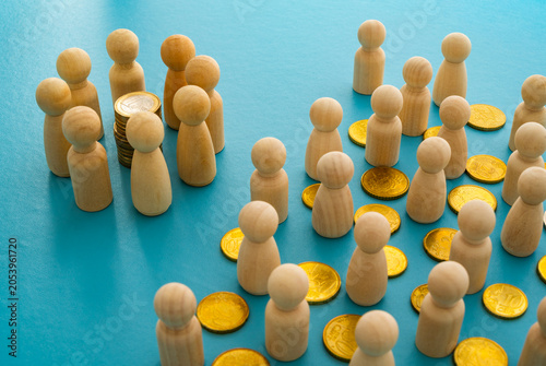 Canvas-taulu Wooden pawns and coins represent protectionism, economic lobbies, competitive markets, and social fragmentation